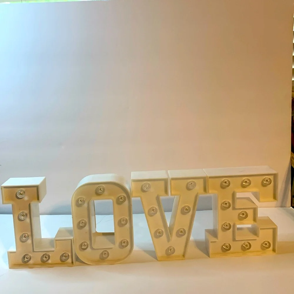 LOVE Letters Light up Size is Approximately 6 1/4 x 5 Plastic Used
